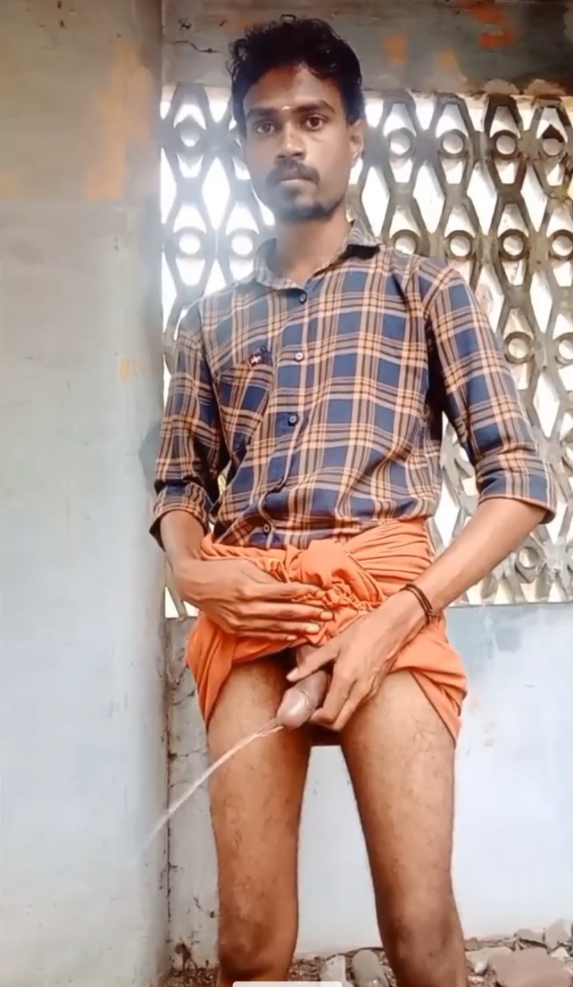 Indian tamil young boy pissing outdoor with big cock