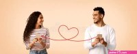 Perfect Match. Interracial Couple Using Dating App on Smartphone Together Stock