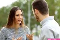 Couple talking outdoors in a park