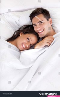 133590 Happy couples bed Shutterstock