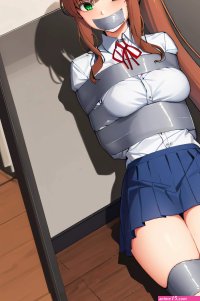 Anime girl with black hair and white shirt sitting on a chest